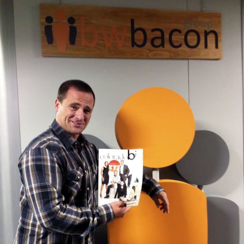 Dave Bacon holding ColoradoBiz Magazine's October 2012 issue of the 250 Top Private Colorado Companies